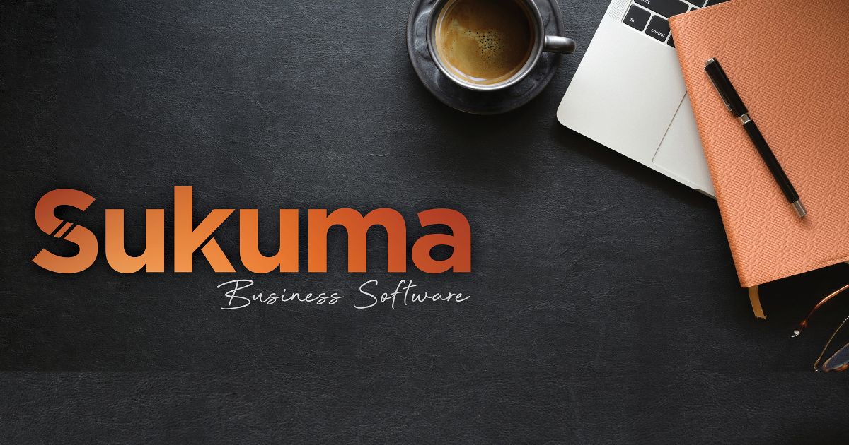 Photo of Sukuma, the business software with a laptop, note book and coffee